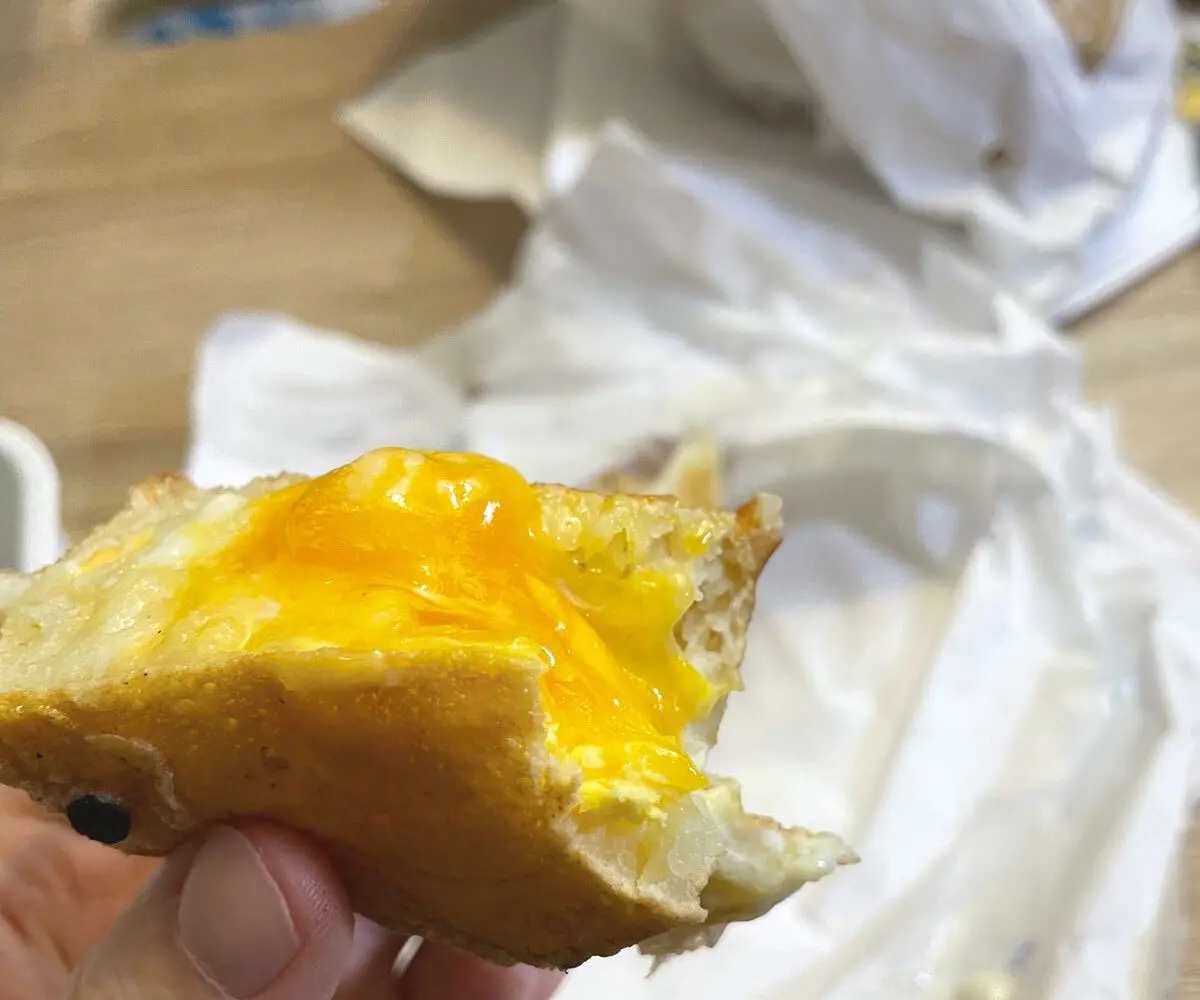 cheese egg wheel pie with a bite